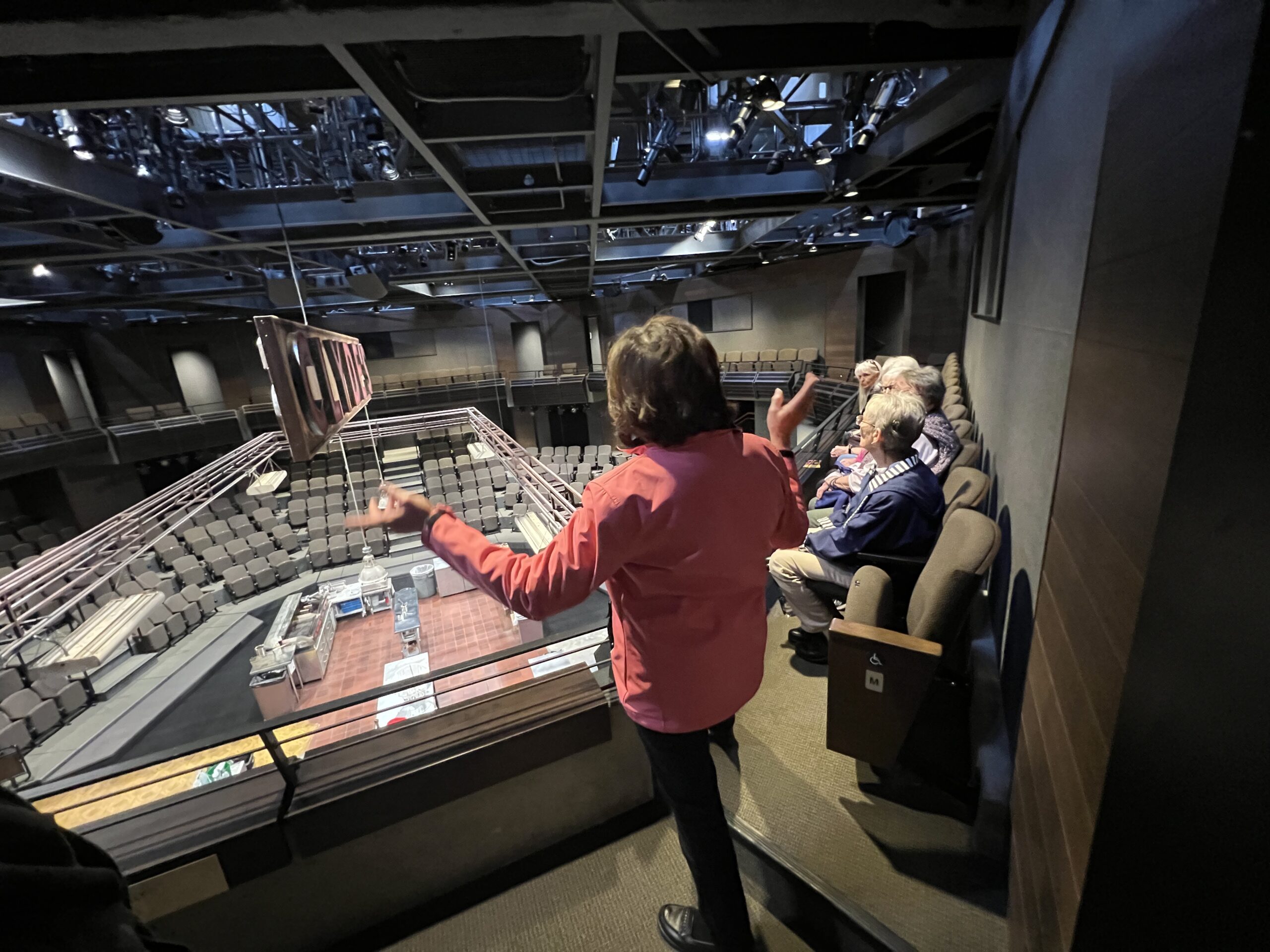 A guide gives a behind the scenes tour at the Denver Center for thePerforming Arts.